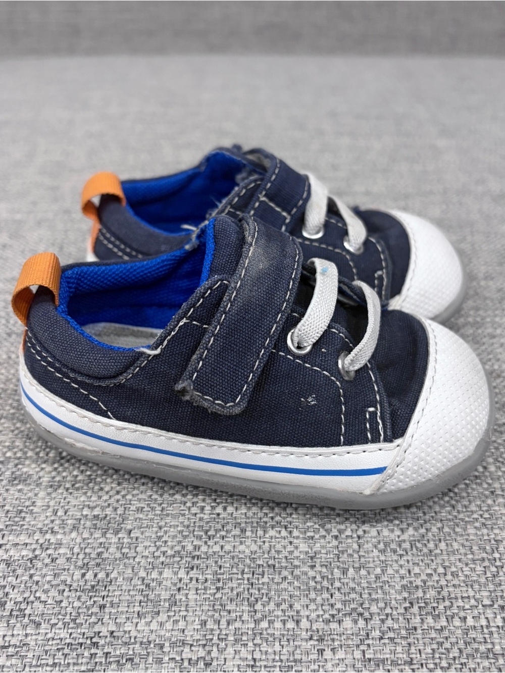 See Kai Run Navy Canvas Sneaker with Orange Heel Loop